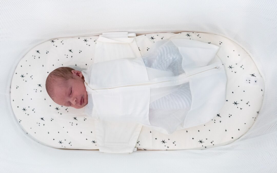 Baby asleep in SNOO